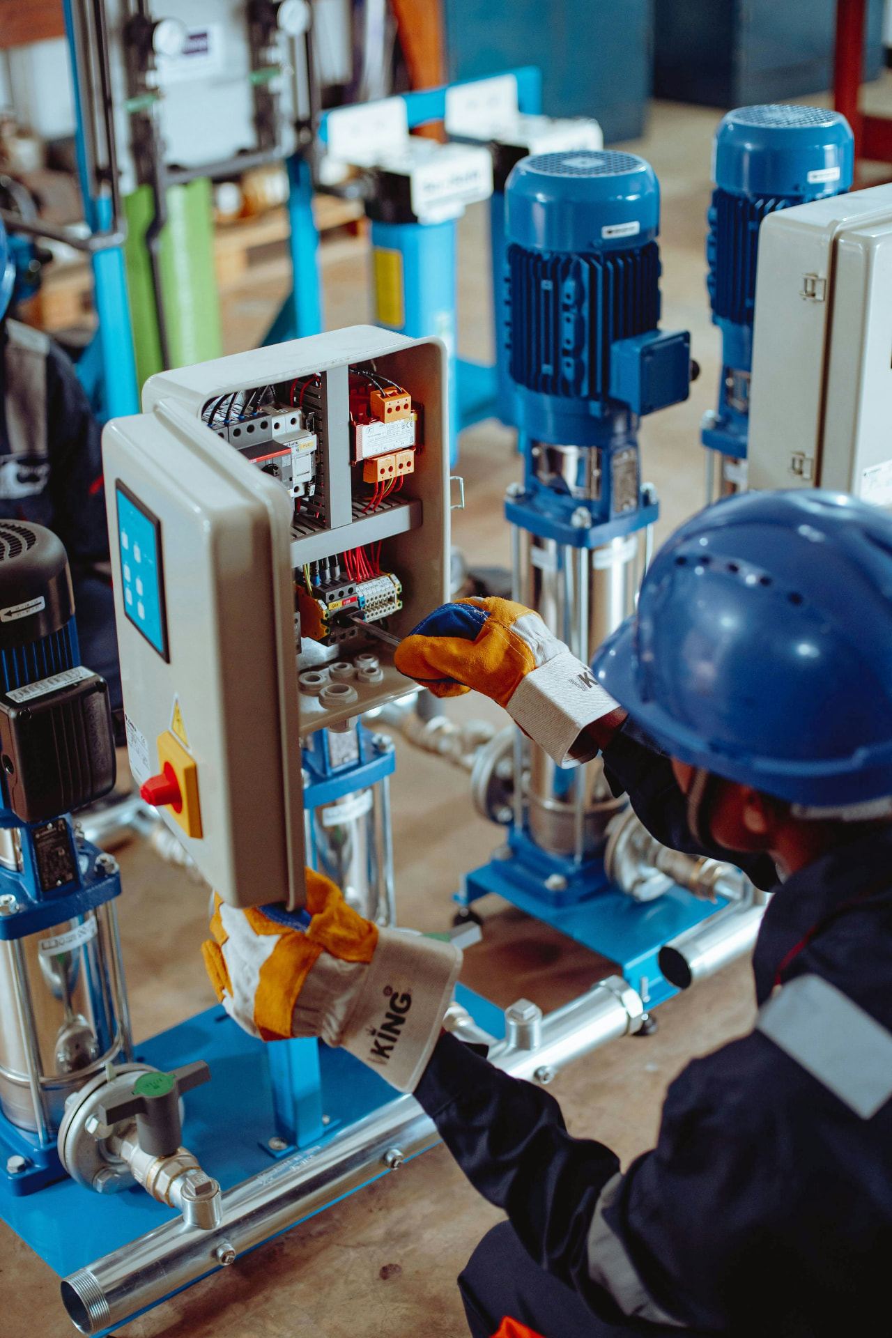 Engineer carrying out a technical review on industrial electrical and mechanical equipment