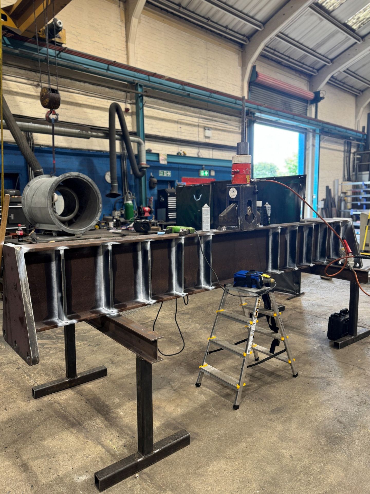 Fabricated 35-tonne lifting beam undergoing workshop inspection