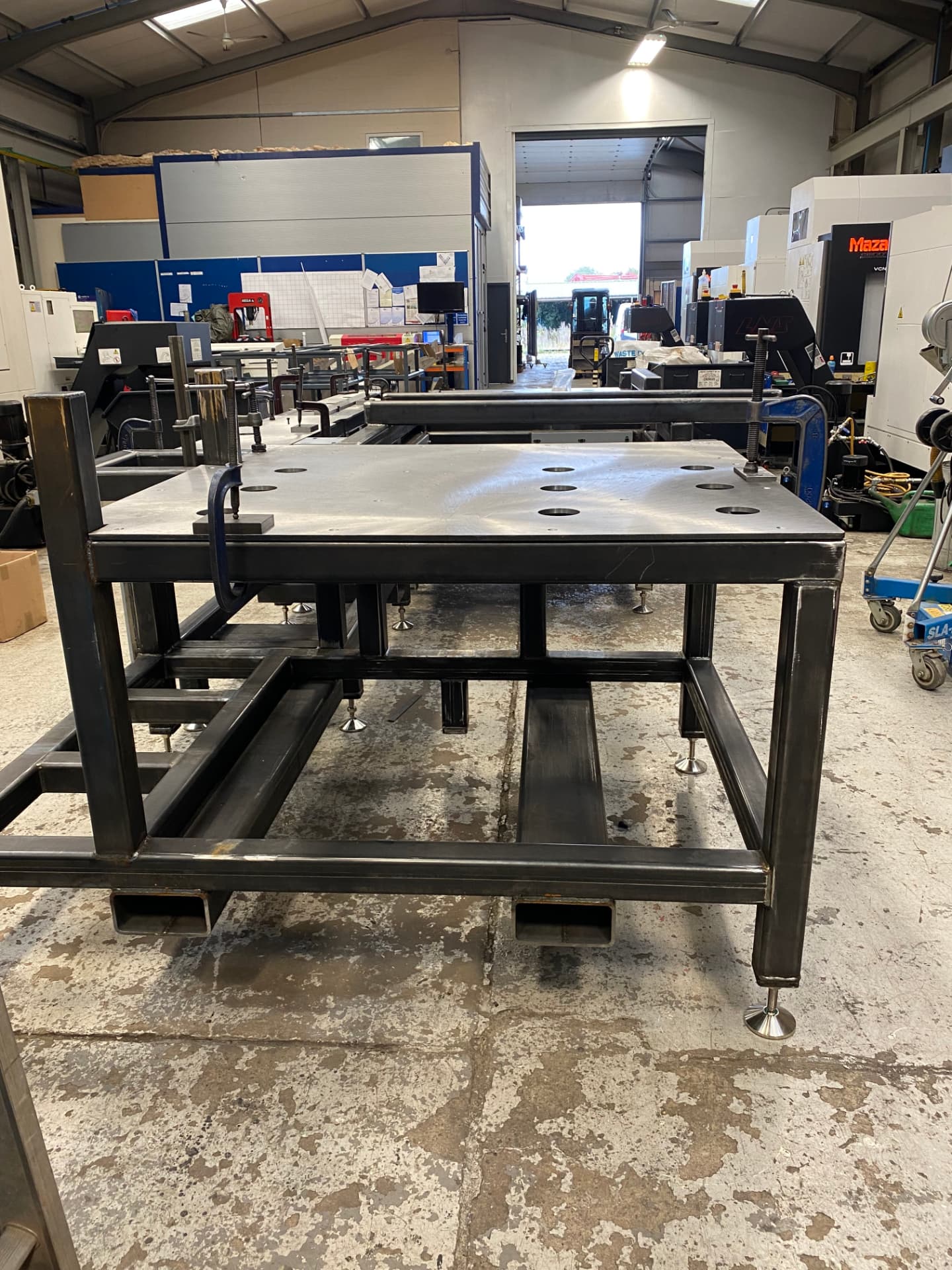 Steel machine frame for the automated drilling and punching system during fabrication