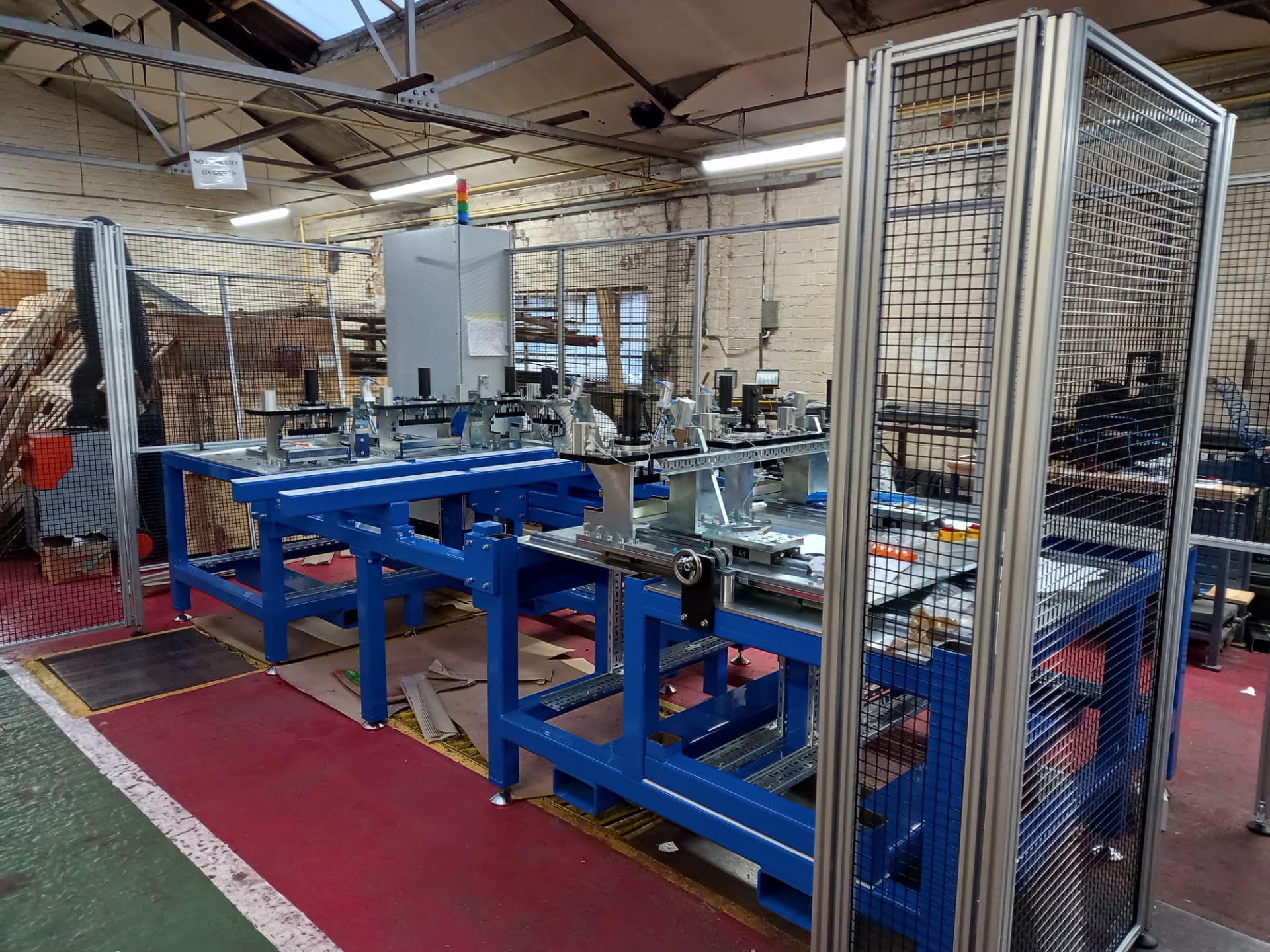 Completed automated drilling and punching system installed with machine guarding